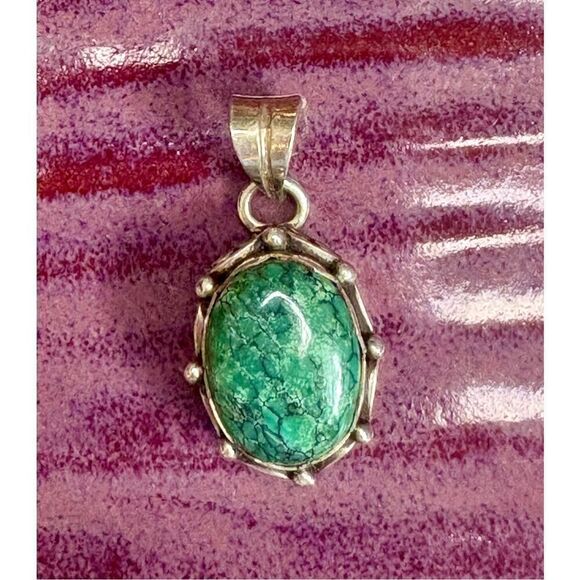 Vintage sterling silver turquoise handmade pendant.
